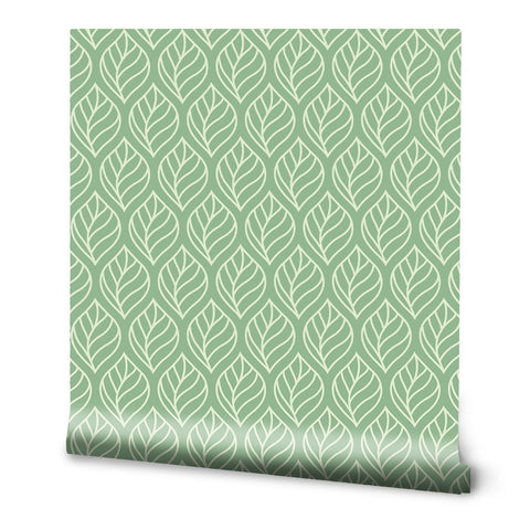Green wallpaper with white leaf pattern in a repeating botanical design