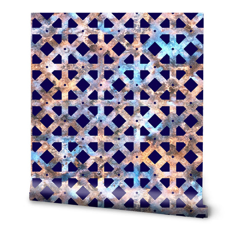 Wallpaper with geometric lattice pattern in metallic shades of blue, bronze, and purple on dark navy background