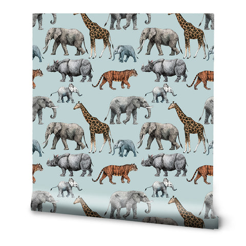 Seamless wallpaper pattern with elephants, giraffes, rhinos, and tigers on a light blue background