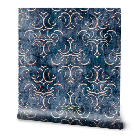 Roll of dark blue wallpaper with ornate vintage-inspired beige and gold pattern