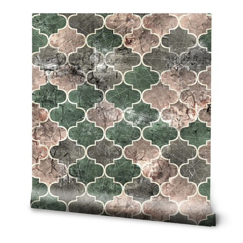 Wallpaper with geometric quatrefoil pattern in green, beige, and gray stone texture