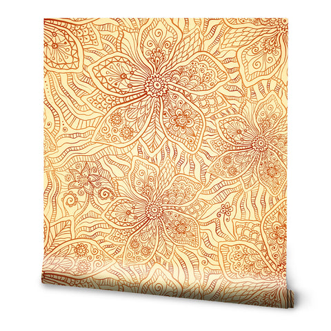 Wallpaper with large orange floral line art pattern on light beige background
