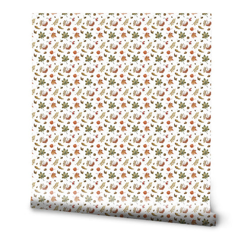 Wallpaper with small floral and leaf patterns in green, orange, and brown on a white background