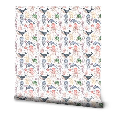 Kids wallpaper with watercolor sea animals including whales, dolphins, turtles, octopuses, jellyfish, seahorses, starfish, and coral on a white background
