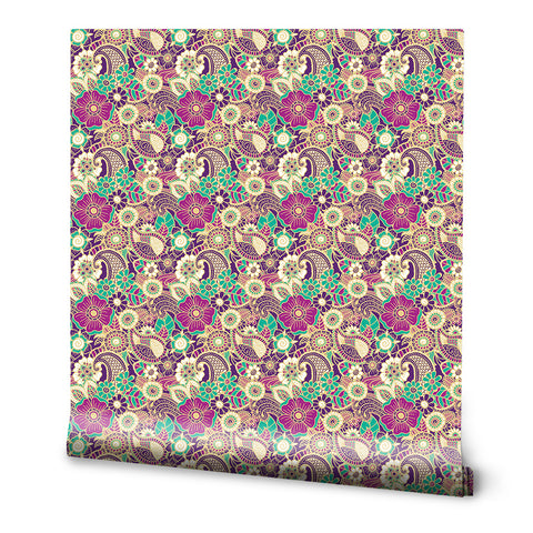 Colorful floral paisley wallpaper with intricate patterns in purple, green, yellow, and cream tones