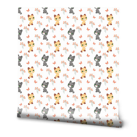 Cute wallpaper with cartoon kittens, flowers, and butterflies on a white background
