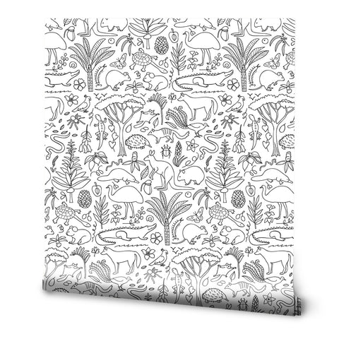A roll of removable wallpaper featuring handdrawn doodles of Australian wildlife and plants in black and white.