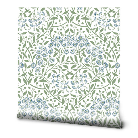 A roll of wallpaper with a delicate green and blue floral pattern.