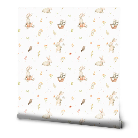 A wallpaper featuring cute animal illustrations, predominantly rabbits, with floral elements in a pastel color palette.