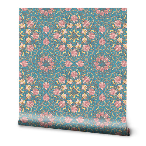 A roll of removable wallpaper with a floral pattern featuring pomegranate motifs in teal, pink, and other colors.