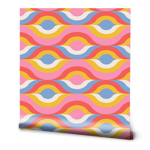 A roll of retro wallpaper with a colorful, psychedelic wave pattern.