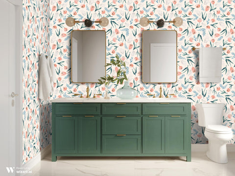 Bathroom interior with floral wallpaper featuring coral pink flowers, green leaves, and blue accents on a light background, paired with a green vanity, double mirrors, and gold fixtures