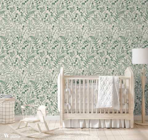 wallpaper featuring a green floral pattern with various weeds and wildflowers on a beige background.