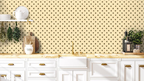 removable wallpaper with a pattern of yellow bees on a beige background.