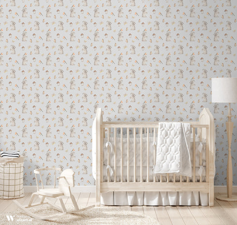 removable wallpaper with a pattern of rabbits, butterflies, and mushrooms in a neutral color palette.