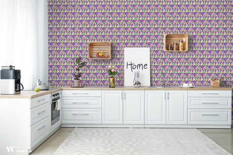 Kitchen interior with white cabinets and a colorful floral paisley wallpaper in purple, green, and yellow tones