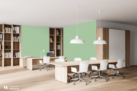 Modern office interior with green wallpaper featuring white leaf pattern on accent walls