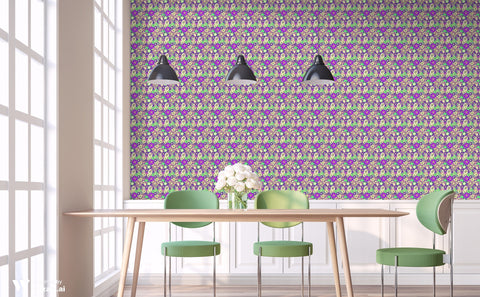Dining area with green chairs, wooden table, and a floral paisley wallpaper in purple, green, and yellow tones