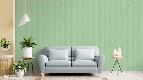 Living room with light blue sofa and green wallpaper featuring white leaf pattern