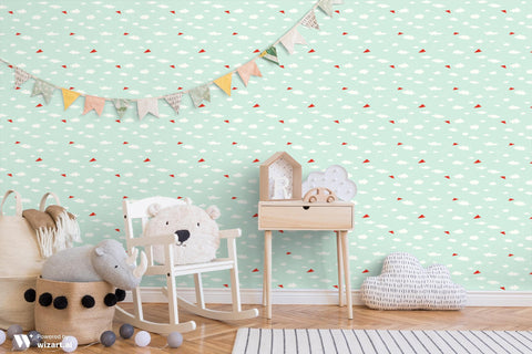 removable wallpaper with a pattern of red paper planes flying against a light blue background with white clouds.