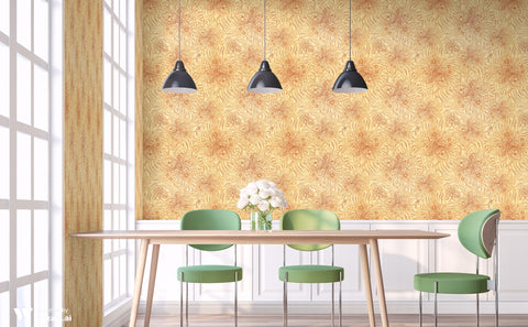 Dining room with wooden table and green chairs against beige wallpaper with orange floral pattern