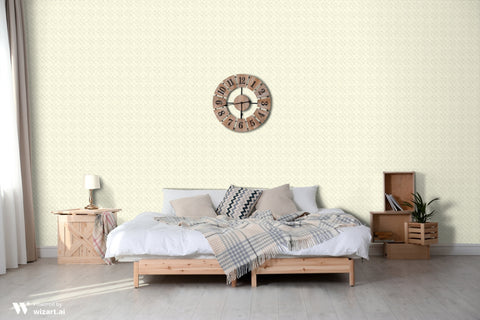 Bedroom interior with beige wallpaper featuring small dotted diamond pattern behind wooden bed and wall clock