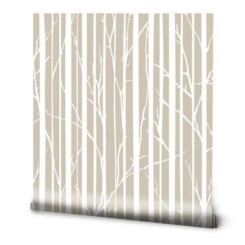 A roll of Tree Branches removable wallpaper in beige and white with a pattern of vertical lines and tree branches.