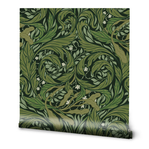 A roll of floral patterned wallpaper with green leaves and white flowers.