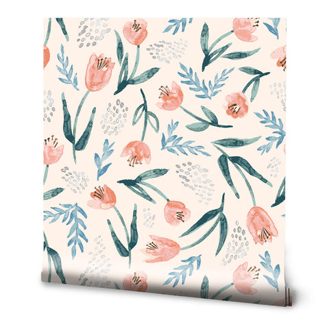 Wallpaper with a watercolor floral design featuring coral pink tulips, green leaves, and light blue sprigs on a cream background