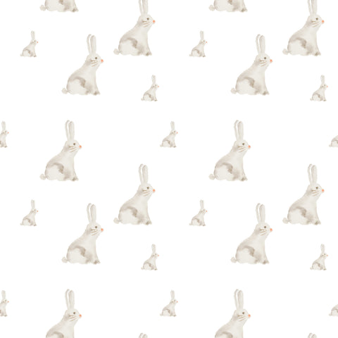 Removable wallpaper featuring a pattern of watercolor-style rabbits on a white background.