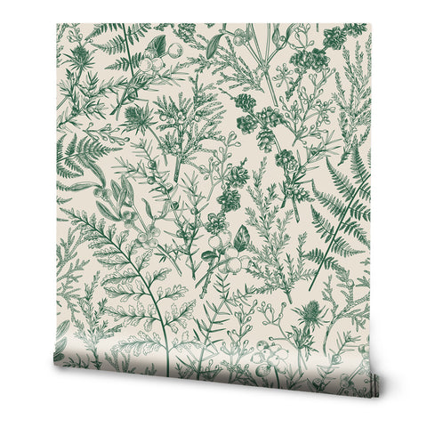 A roll of wallpaper featuring a green floral pattern with various weeds and wildflowers on a beige background.