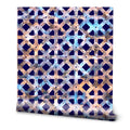 Wallpaper with geometric lattice pattern in metallic shades of blue, bronze, and purple on dark navy background