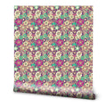 Colorful floral paisley wallpaper with intricate patterns in purple, green, yellow, and cream tones