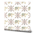 Wallpaper with decorative elephants and geometric tribal patterns in beige, teal, and coral on a white background