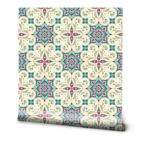 Ornate floral tile pattern wallpaper in beige, teal, and red tones, inspired by Mediterranean design.
