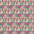 Colorful floral paisley wallpaper with intricate patterns in purple, green, yellow, and cream tones