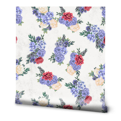 Floral wallpaper with purple hydrangeas, red peonies, and cream roses on a soft white background with a subtle texture.
