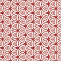 Wallpaper with geometric red and white pattern featuring repeating triangular floral shapes