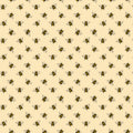  removable wallpaper with a pattern of yellow bees on a beige background.