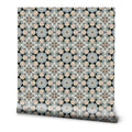 Wallpaper with kaleidoscope-inspired geometric pattern in beige, blue, and black star motifs