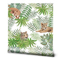 A roll of removable wallpaper with a design featuring lions, tigers, and lush green leaves.