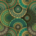 Wallpaper made of overlapping decorative mandala-style circles with intricate geometric patterns in shades of green, teal, brown, and gold on a dark background