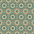 Repeating ornamental wallpaper pattern with circular mandala-like motifs in teal, beige, and black, surrounded by interwoven geometric shapes
