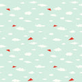 removable wallpaper with a pattern of red paper planes flying against a light blue background with white clouds.