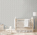 Removable wallpaper featuring a pattern of white swans on a gray background.


