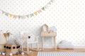 removable wallpaper with a pattern of white llamas on a white background.