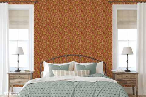 Bedroom interior with red paisley patterned wallpaper, white curtains, wooden side tables, and a bed with green and white bedding
