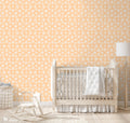  wallpaper with a floral pattern featuring peach colored flowers on a white background.