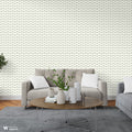 Living room with light wavy line wallpaper behind modern sofa and coffee table