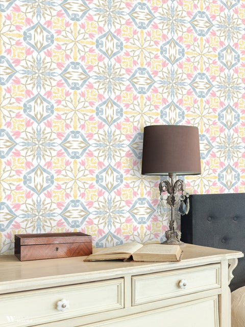 Pink and blue floral wallpaper design used in a cozy bedroom or study room with classic wooden furniture